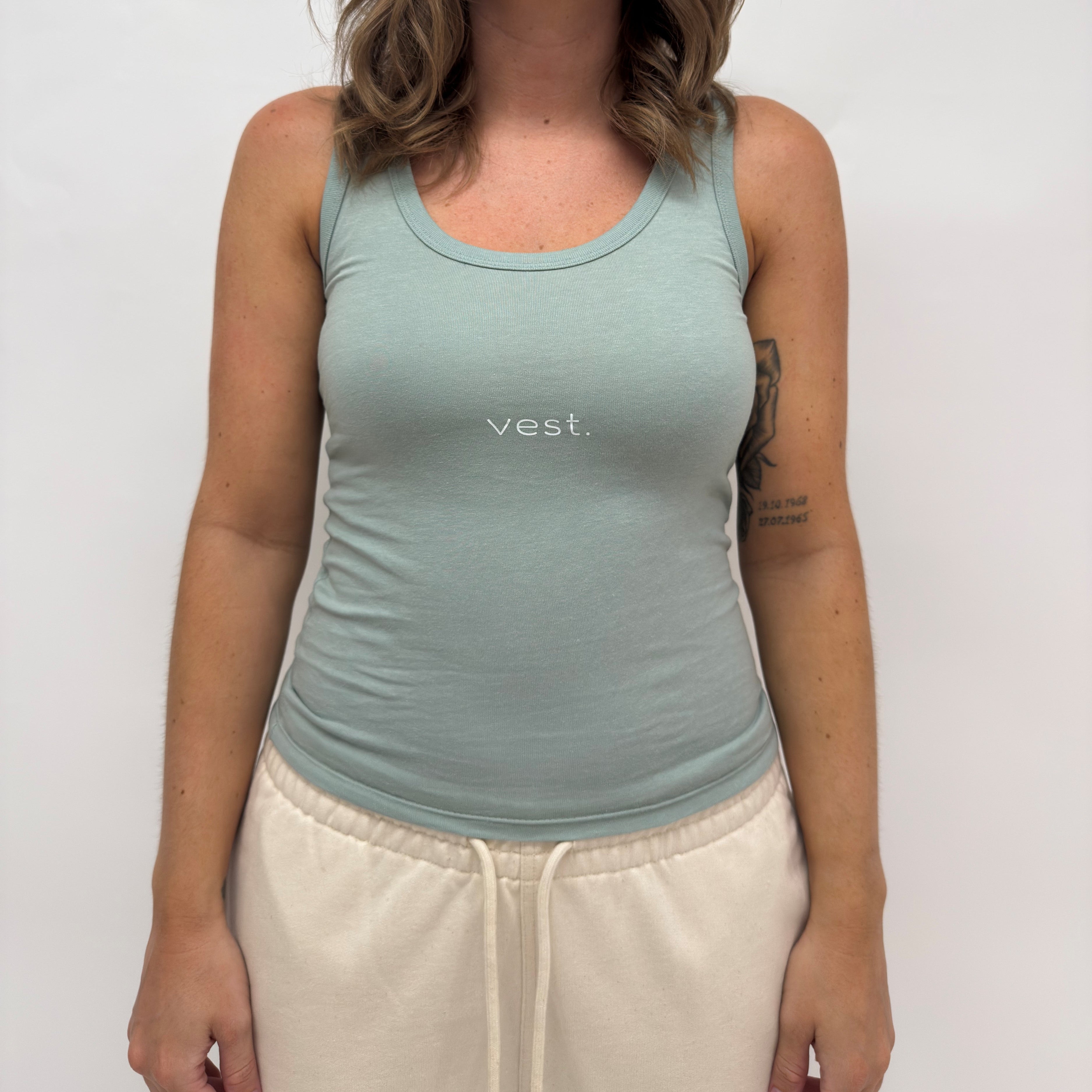 simple. fitted vest. aloe.