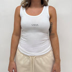 simple. fitted vest. white.