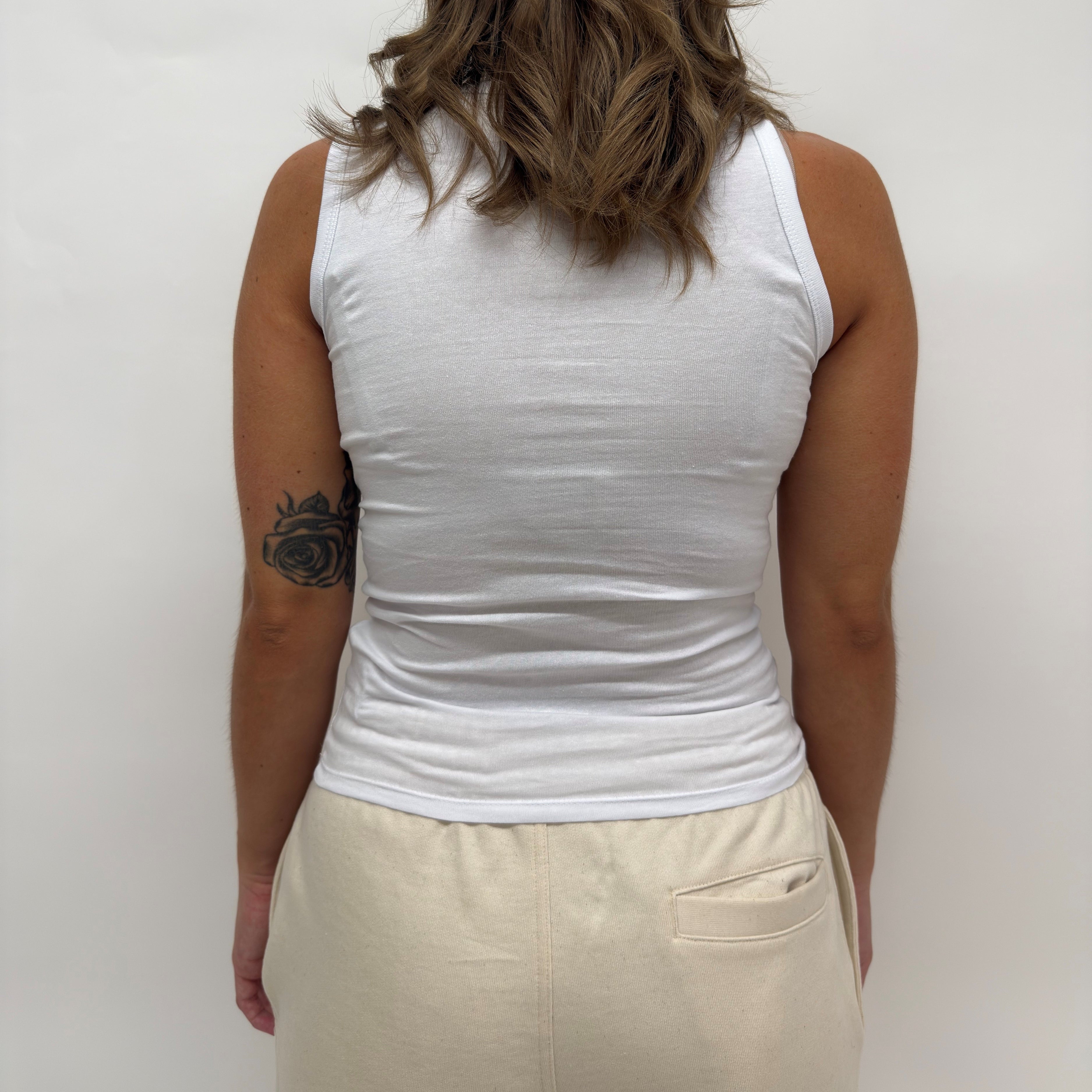 simple. fitted vest. white.