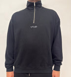 simple. heavy 1/4 zip. black.