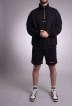 simple. heavy 1/4 zip. black
