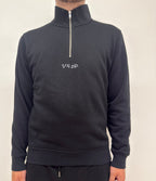 simple. light 1/4 zip. black.