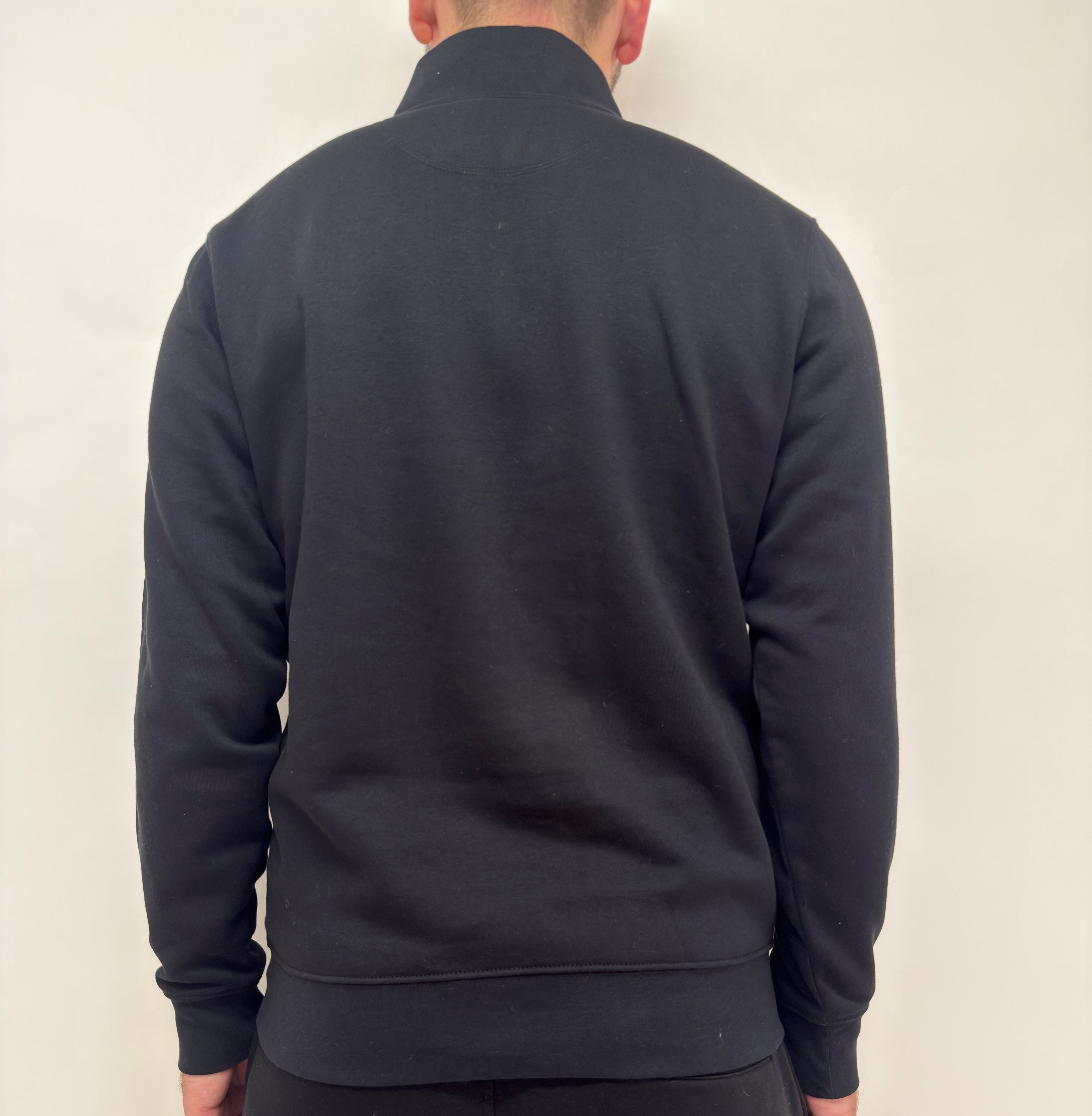 simple. light 1/4 zip. black.